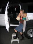 Before the wedding there was the bachelorette party.  Here Jean gets into the Hummer Limo with 2 Tiki dolls.