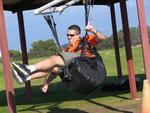 Sam practices his para-gliding.