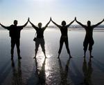 Hands across the beach.