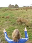 Lindsay looks at the roofless house.