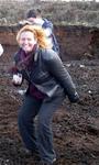 Cherie jumping on a bog.  Bogs are smooshy and fun to play on.