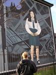 Lindsay looks at a mural.