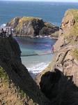 The Carrick-a-rede rope bridge, swings 80-feet over the crashing sea.