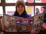 Renee checks out the menu at the Bad Ass Cafe.