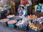 Lady selling fish.