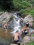 Everyone rinses off in the stream after the first day of trekking.