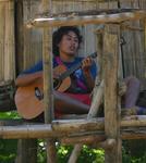 Our guide playing the guitar. *Photo by Yorham.