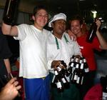 Now that's what I call a round of beers!  Leighton and Cherie make friends with the train porter.