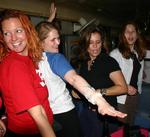 The girls rocking out in the aisle. *Photo by Yorham.