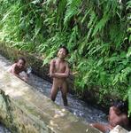 Balinese boys playing in the water.