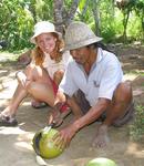 He cracks home the coconut.