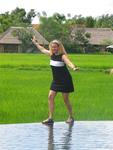 Cherie balancing on the infinity pool.