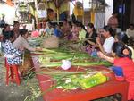 The women are clustered inside making elaborate preparations for the ceremony.