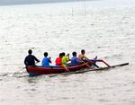 Paddling across the lake.