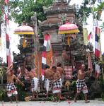 Flowers fall to help the Barong fight the Rangda.