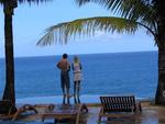 A newly married couple admires the view.