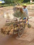 A broom-seller in Koh Lanta.