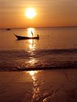 A fisherman at sunset.