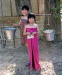 Young girls fetching water from the river.