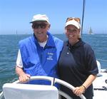 Cherie at the helm with sailing icon Roy Disney, on his Reichel-Pugh MaxZ86 "Pyewacket."