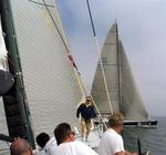 The Reichel-Pugh 78 "Scout Spirit" crosses "Pyewacket's" bow.