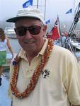 Roy smiles, the last day of racing he wears a lucky lei.