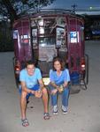 Diane and Leighton wait by our Thai transportation.