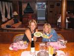 Jean and Caitlyn with the Caesar salad with roasted garlic and smoked fresh mozzarella.