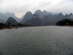 Karst mountains veiled in fog.  (Beijing has smog, Guilin has fog.)