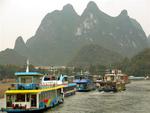 Tourist cruise boats arriving in Yangshuo.