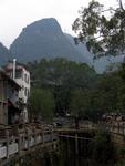 Scott crosses a bridge in Yangshuo.