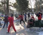 Women fight off the freezing Beijing winters by mastering their sword play.