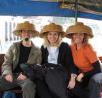 Scott, Margaret and Cherie continue their journey through Aberdeen Harbor (with complimentary hats included while you ride.)