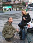 As the sun decends, Scott, Margaret and I share a bottle of wine while meandering down the streets of Macau.