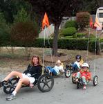 Don't be fooled by the smiles.  Every kid is on the verge of tears because they can't figure out how to ride the difficult banana-bikes.