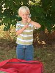 Tanner helps me assemble my tent. *Photo by Dad.