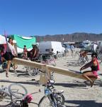 Cherie and Karem on the old-fashioned teeter-totter.