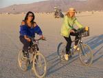 Karem and Margaret riding through the desert.