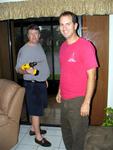 Patrick puts the boards up again, after Hurricane Wilma rips them down.