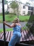 A tree falls alongside Patsy's house; she peeks outside to check for damage.