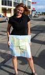 Show me your map of Tassie!  Cherie holds up a map of Tasmania, Australia's only island state. 