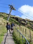 The twins walking up "the Nut" in Stanley. 