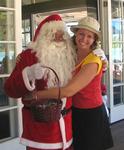 Cherie gives Santa a big hug!  