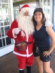 Hilda gets her Chrismas hug from the chubby guy in the red suit.