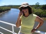 Diane gets phone service on the ferry back to reality.  (She's saying something gushy-mushy to her boyfriend Justin.)