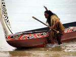 A warrior with his waka.