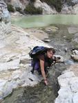 Crystal checks the tempurature of the bath-like water.