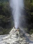 The geyser keeps shooting out water and steam for over an hour.  