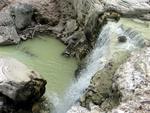 Thw green water of Lake Ngakoro Waterfall.