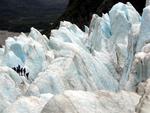 Dwarfed by the ice.